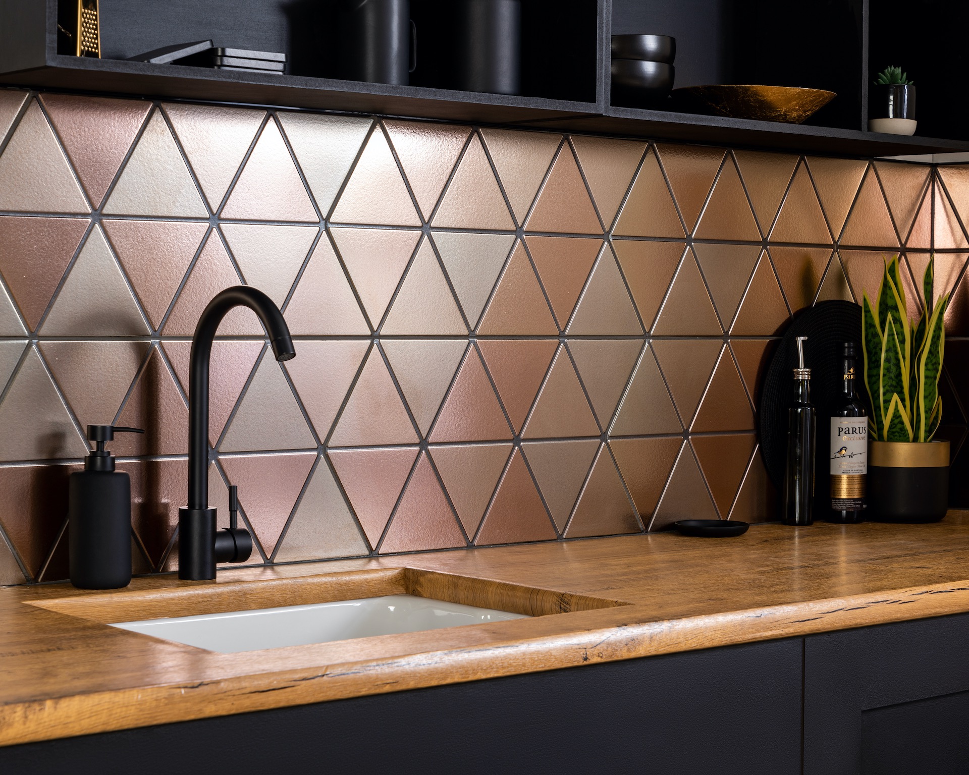 Aura Metallic Triangle Porcelain Wall Tiles on splashback