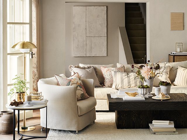 beige sofa and brass accents - sneak preview of H&M Home's upcoming collection - shopping