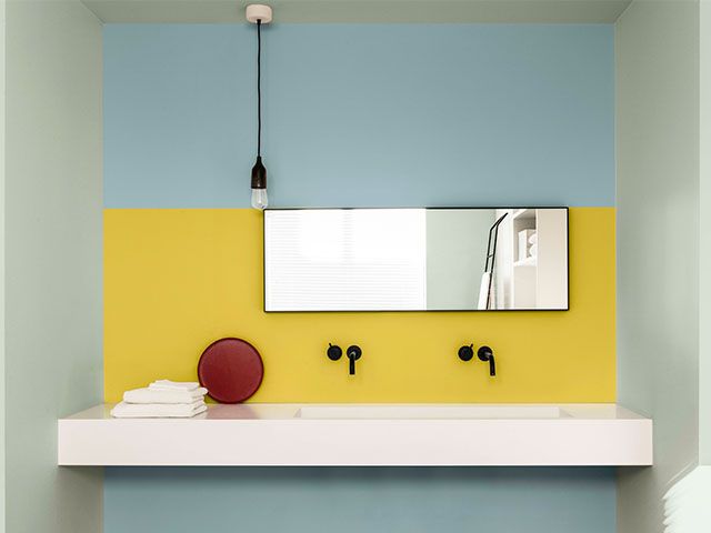 black taps in yellow bathroom - design ideas for statement bathrooms - bathroom - goodhomesmagazine.com