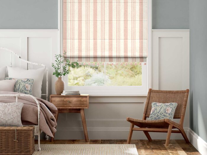 Bring Peach Fuzz into the room with subtle stripes in soft furnishings. 