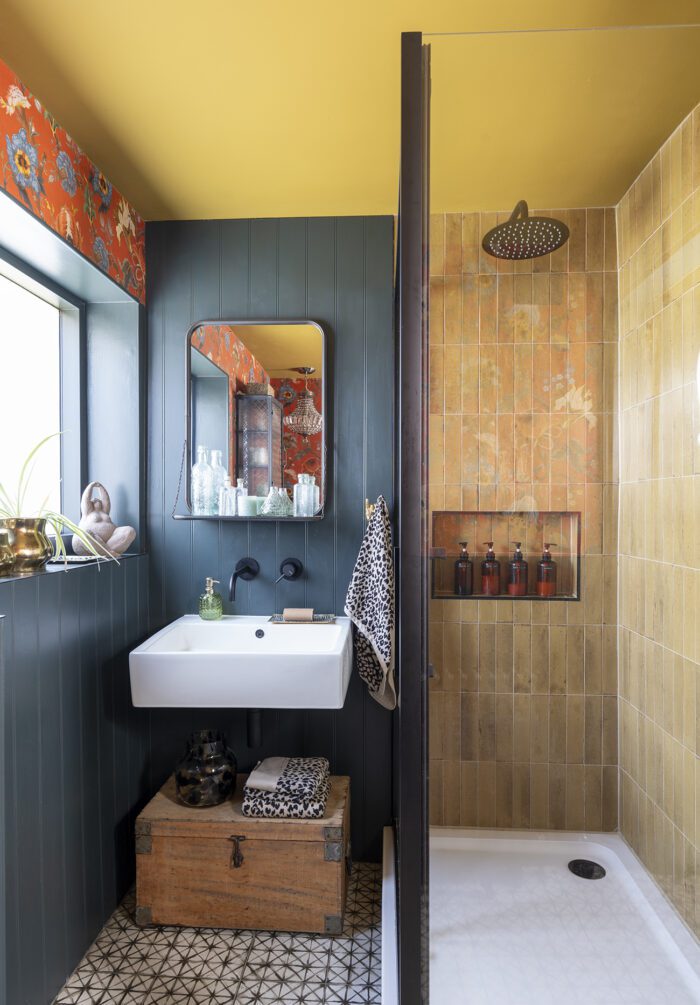 Local company St Neots Interiors worked with Kerry on the design of the new shower room and supplied the sanitaryware. Kerry has added strong colour with Artemis Sienna wallpaper, and Serpentine paint on the panelling, both House of Hackney, while the Zellica Ochre tiles in the shower are from Topps Tiles.  