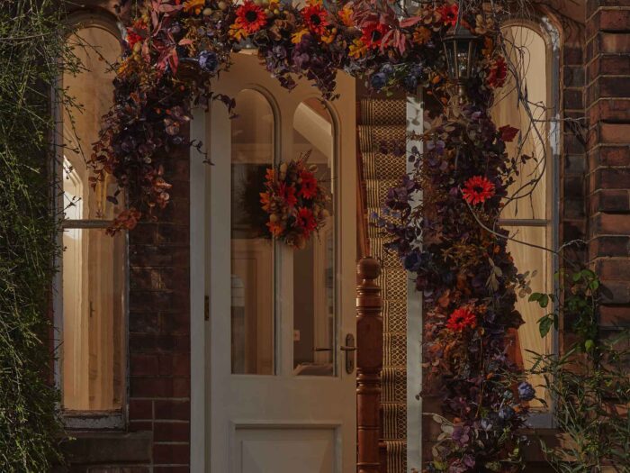 If you're thinking of going all out with your festive decor, then try some showstopper doorscaping