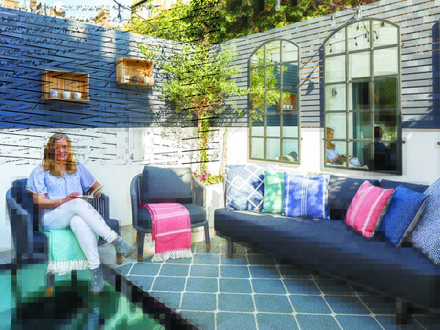 Mediterranean courtyard garden, with colourful cushions, outdoor rug and display shelfies, goodhomesmagazine.com