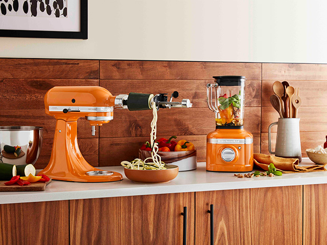 kitchenaid honey blender and artisan mixer in a wood and tile kitchen - goodhomesmagazine.com