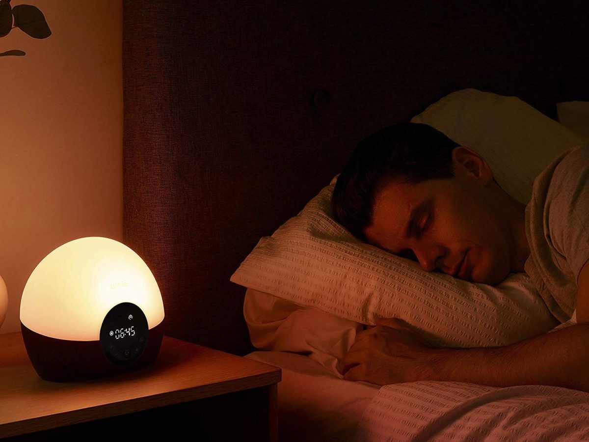 lumie bodyclock wake up alarm clock in bedroom - goodhomesmagazine.com 