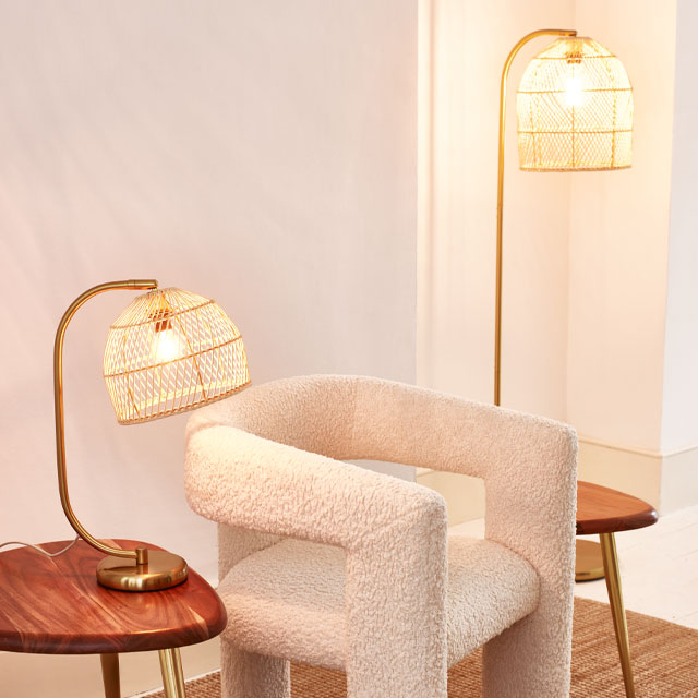 rattan lamps styled with sheepskin chair from Oliver Bonas