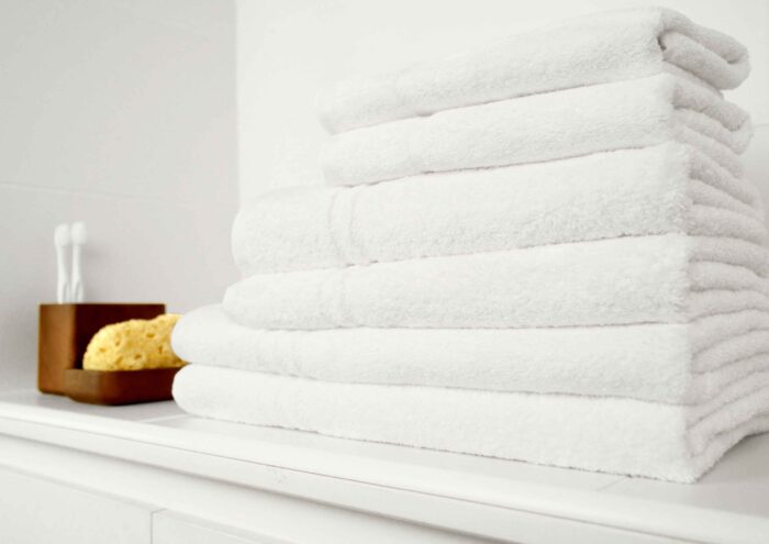 A stack of clean, white fresh towels is ideal to wrap up in post bath