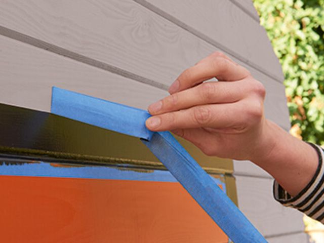 taking off frog tape - how to create a modern garden office - garden - goodhomesmagazine.com