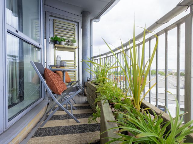 Small balcony with slim furniture