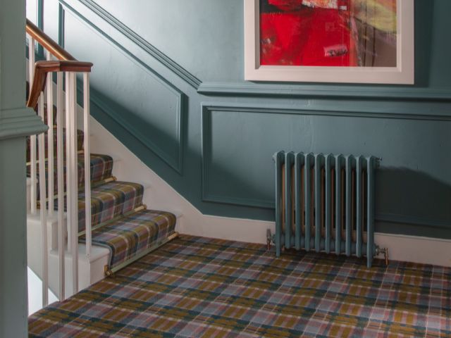Tartan carpet on a staircase. Alternative Flooring