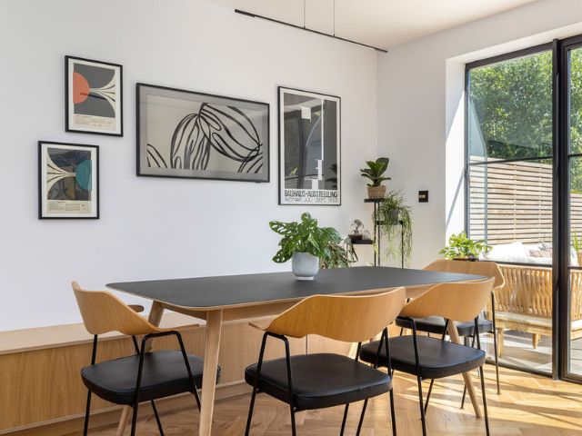 Dining room extension with a feature gallery wall