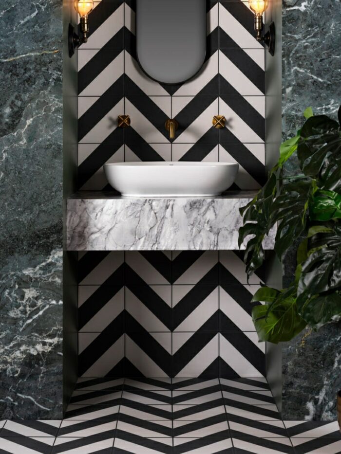 Chevron tiles in monochrome cloakroom