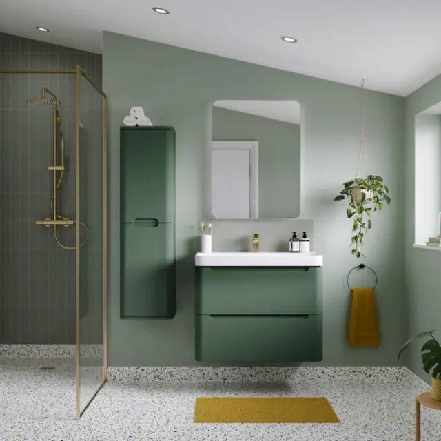 Green bathroom suite with botanicals